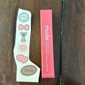 Rhode Limited Edition Sugar Cookie Lip Peptide Treatment with some stickers